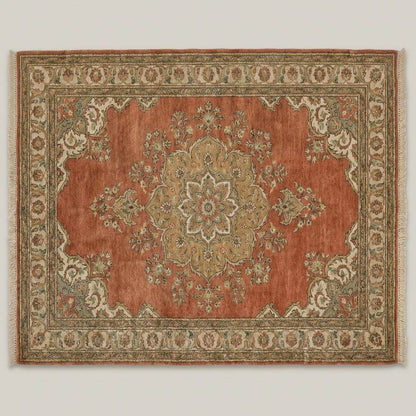 Traditional Oushak style hand knotted rug with warm terracotta and sage green tones