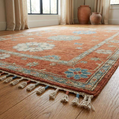 10x12 hand knotted Oushak rug in terracotta rust and blue wool with geometric floral pattern