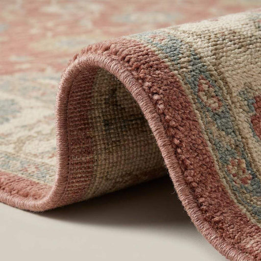 Hand knotted Oushak rug with vintage floral dusty pink wool design for living room decor