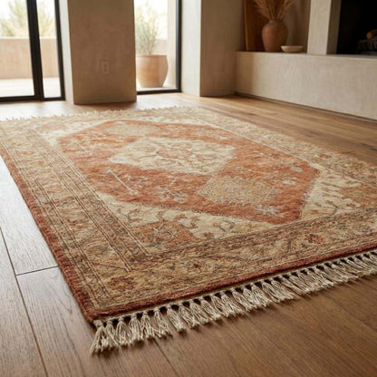 Large terracotta hand knotted rug placed under curved beige sofa in modern Mediterranean interior __etsy:7731096884