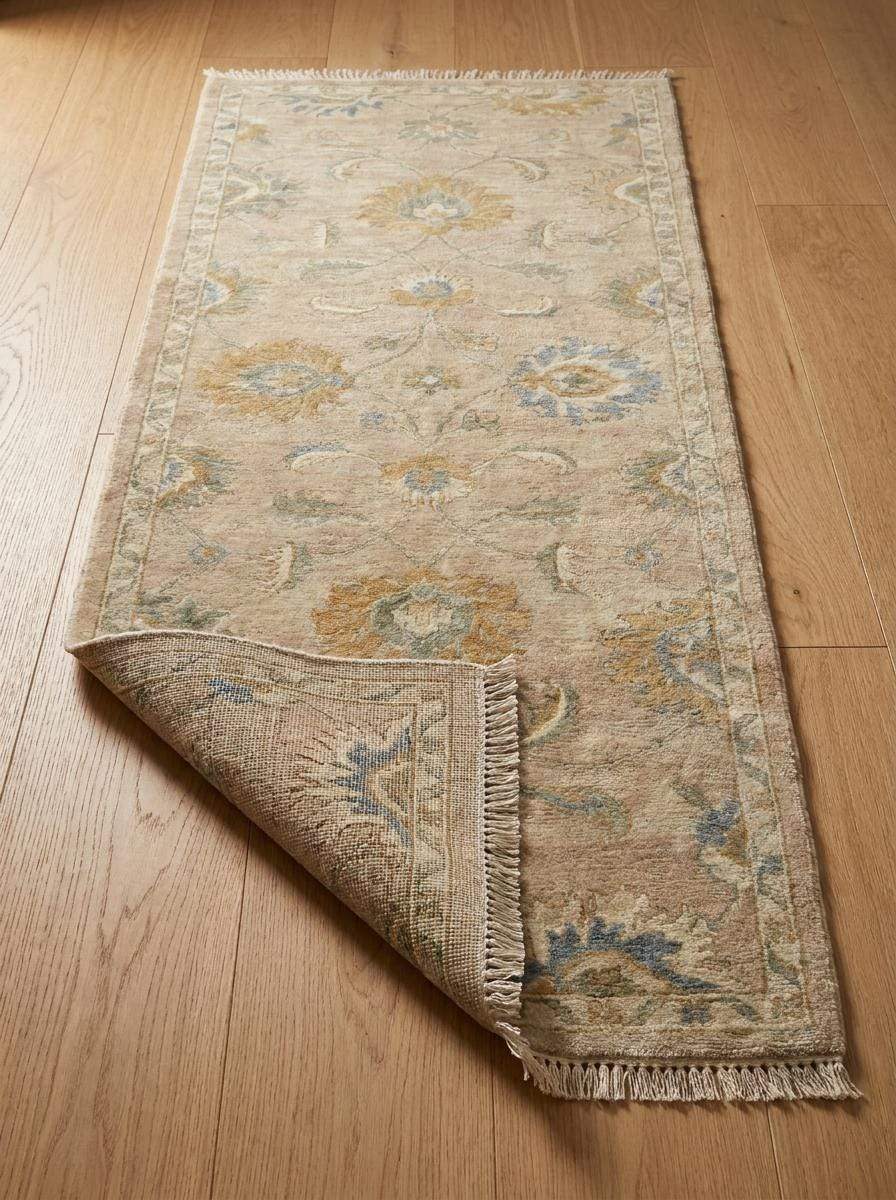 Close-up view of hand knotted wool fibers showing low pile texture, artisan craftsmanship, detailed floral pattern, and traditional construction __etsy:8139894747