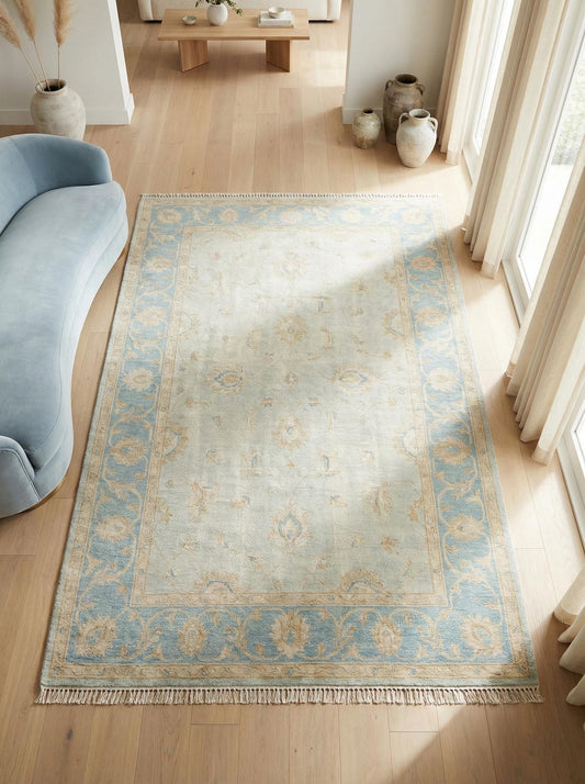 Hand knotted Oushak style wool rug in soft blue with vintage floral design, 8x10 or 9x12 size