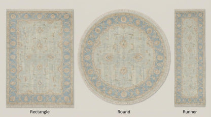 Hand knotted Oushak style wool rug in soft blue with vintage floral design, elegant and durable area rug for living rooms and bedrooms