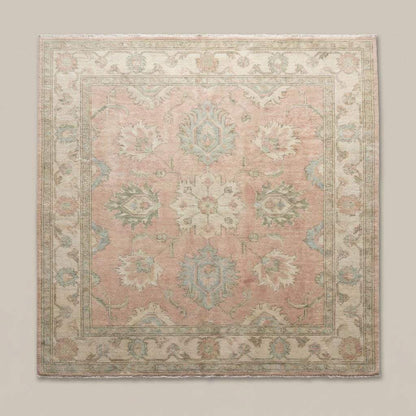 Oushak floral medallion rug detail with classic botanical motifs and symmetrical hand woven design.