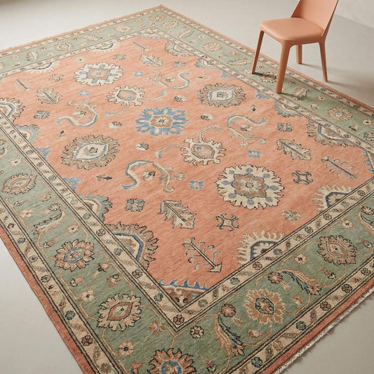Hand knotted Oushak wool rug with peach and sage floral design for living room and bedroom