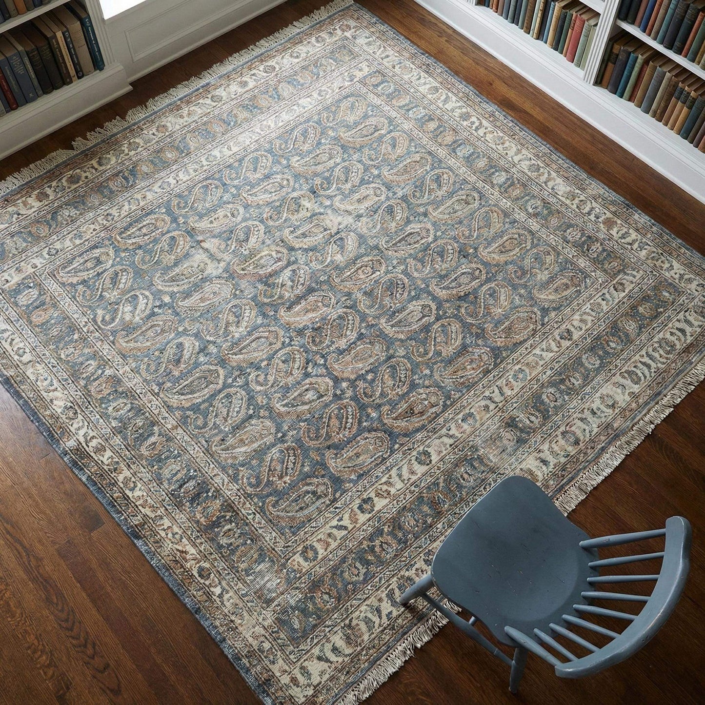 Hand knotted Oushak wool area rug with blue paisley design for traditional living room