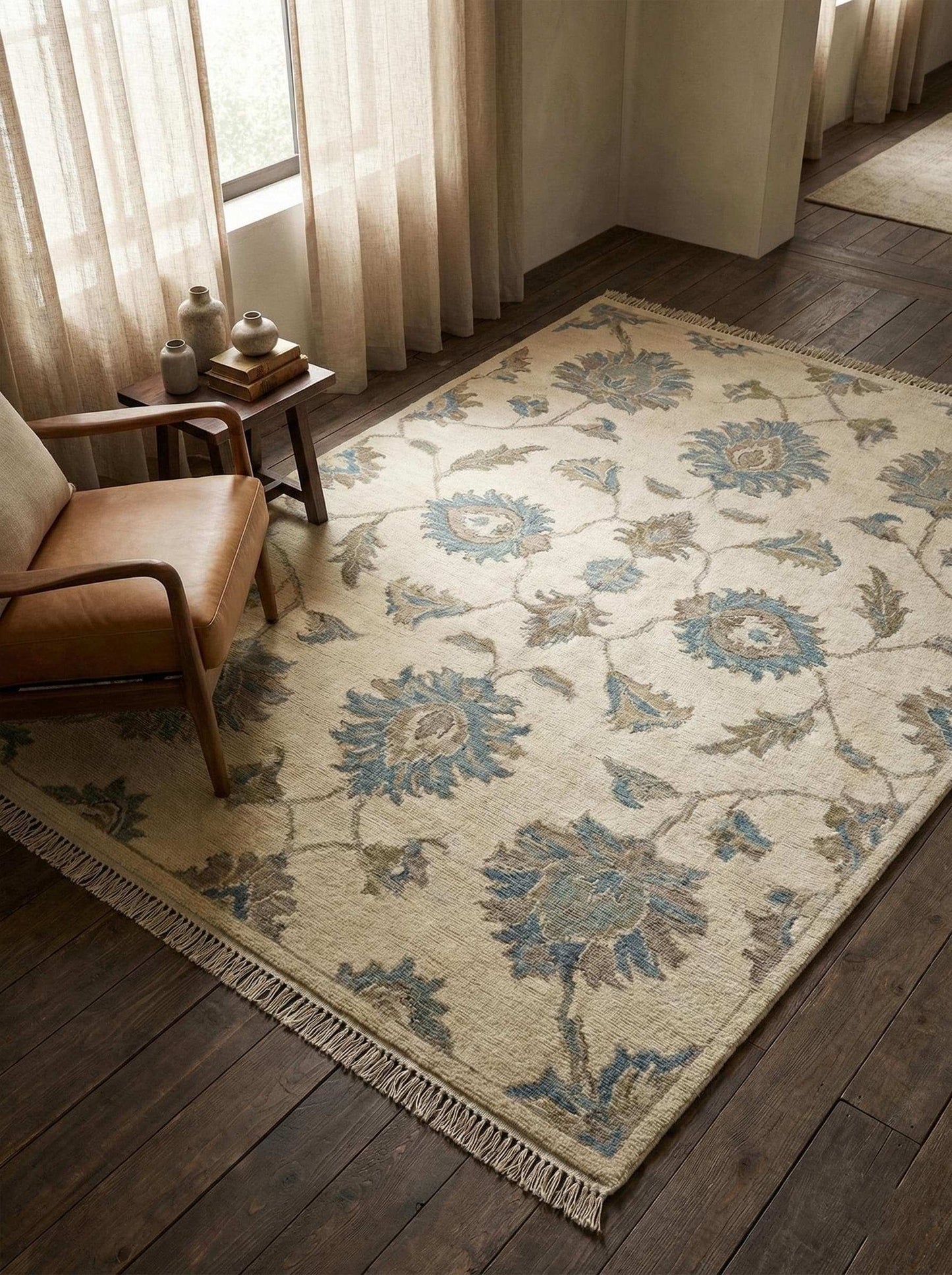 Hand knotted Oushak wool rug with neutral floral design for elegant living rooms and bedrooms