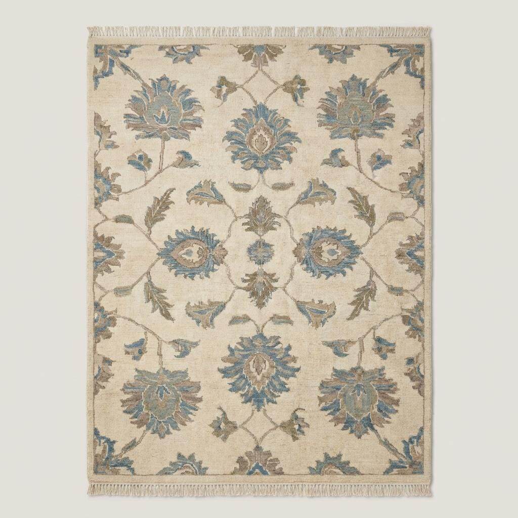 Traditional floral Oushak area rug in muted blue and cream colors with handcrafted wool pile
