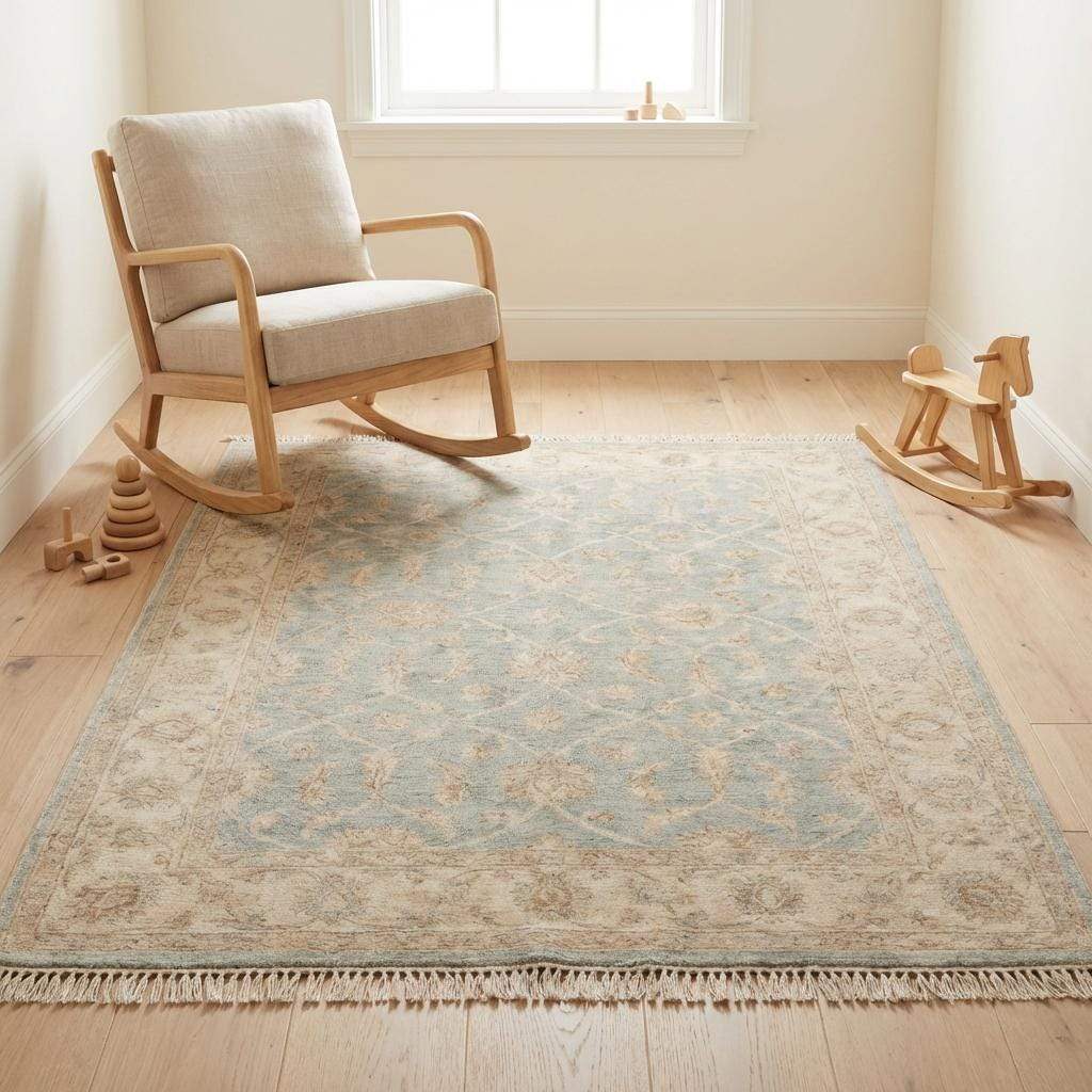 Hand knotted Oushak wool rug in light blue and beige with vintage floral design and low pile for living room.