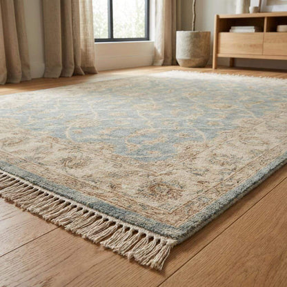 Hand knotted Oushak wool rug in light blue and beige with vintage floral design and artisan craftsmanship