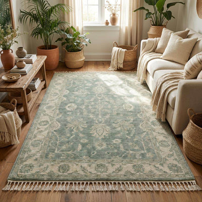 Hand knotted Oushak wool rug in sage green with vintage floral Persian design