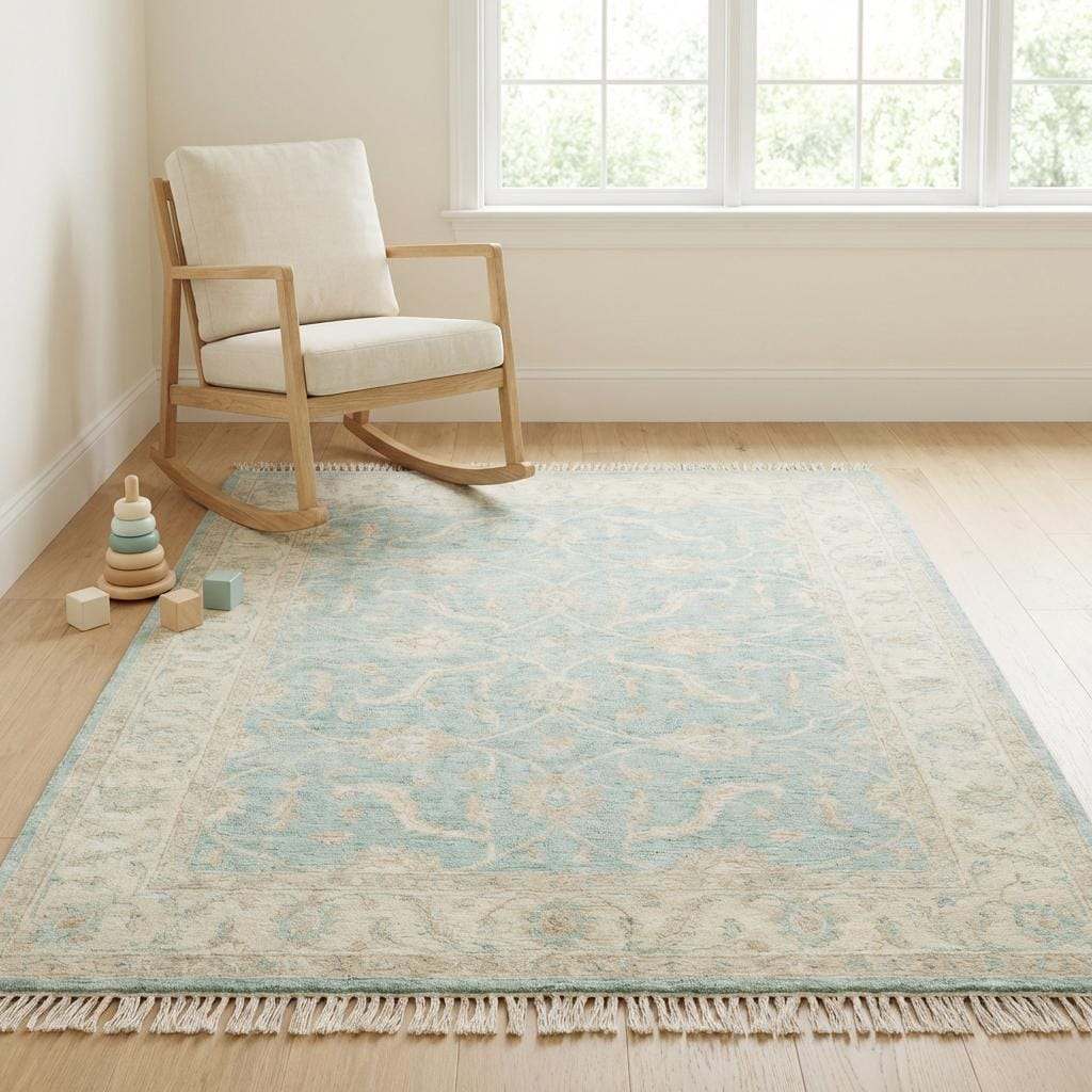 Hand knotted Oushak wool rug with vintage blue floral design in soft neutral living room setting