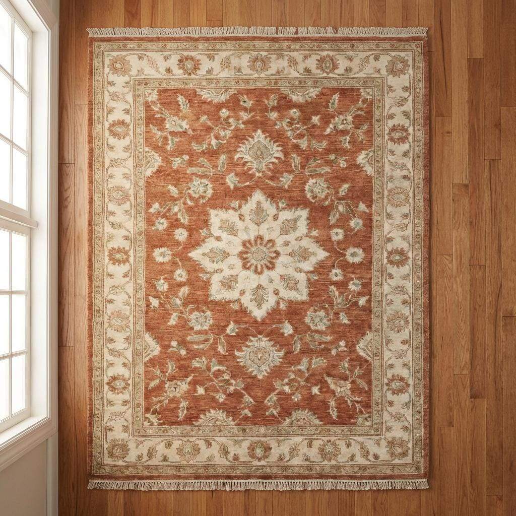 Rectangular hand knotted area rug with earthy colors and timeless floral design