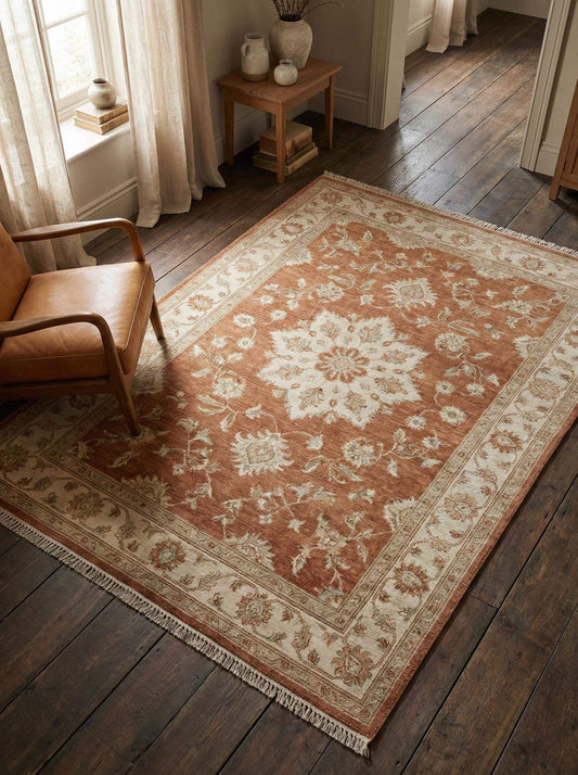 Hand knotted Oushak wool rug with floral medallion design for living room decor