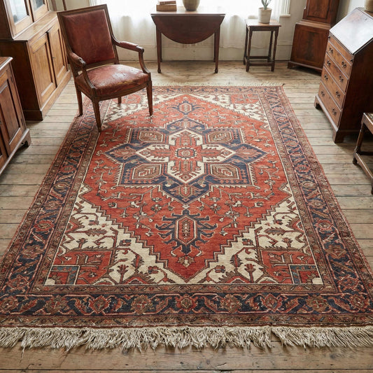 Hand knotted Persian medallion wool area rug with intricate design and warm rust navy tones