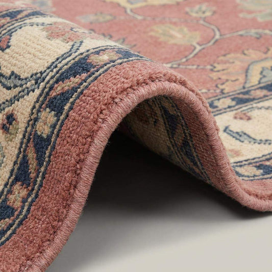 Close-up view of hand knotted wool rug showing dense pile, individual knot craftsmanship, natural wool fibers, and detailed floral design. __etsy:8121619441