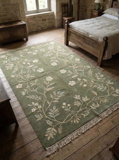 Hand knotted sage green wool Oushak floral area rug with traditional craftsmanship for bedroom decor