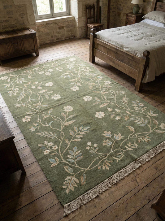 Hand knotted sage green wool Oushak floral area rug with traditional craftsmanship for bedroom decor