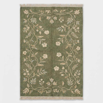 Floral hand knotted wool area rug with ivory and muted blue botanical details
