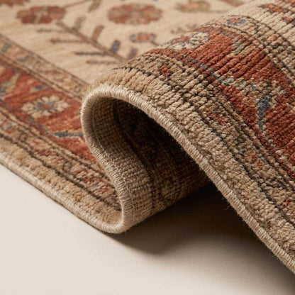 Close-up of hand knotted wool rug texture showing individual knots, dense pile, cotton fringe, and detailed floral weaving __etsy:7998262811