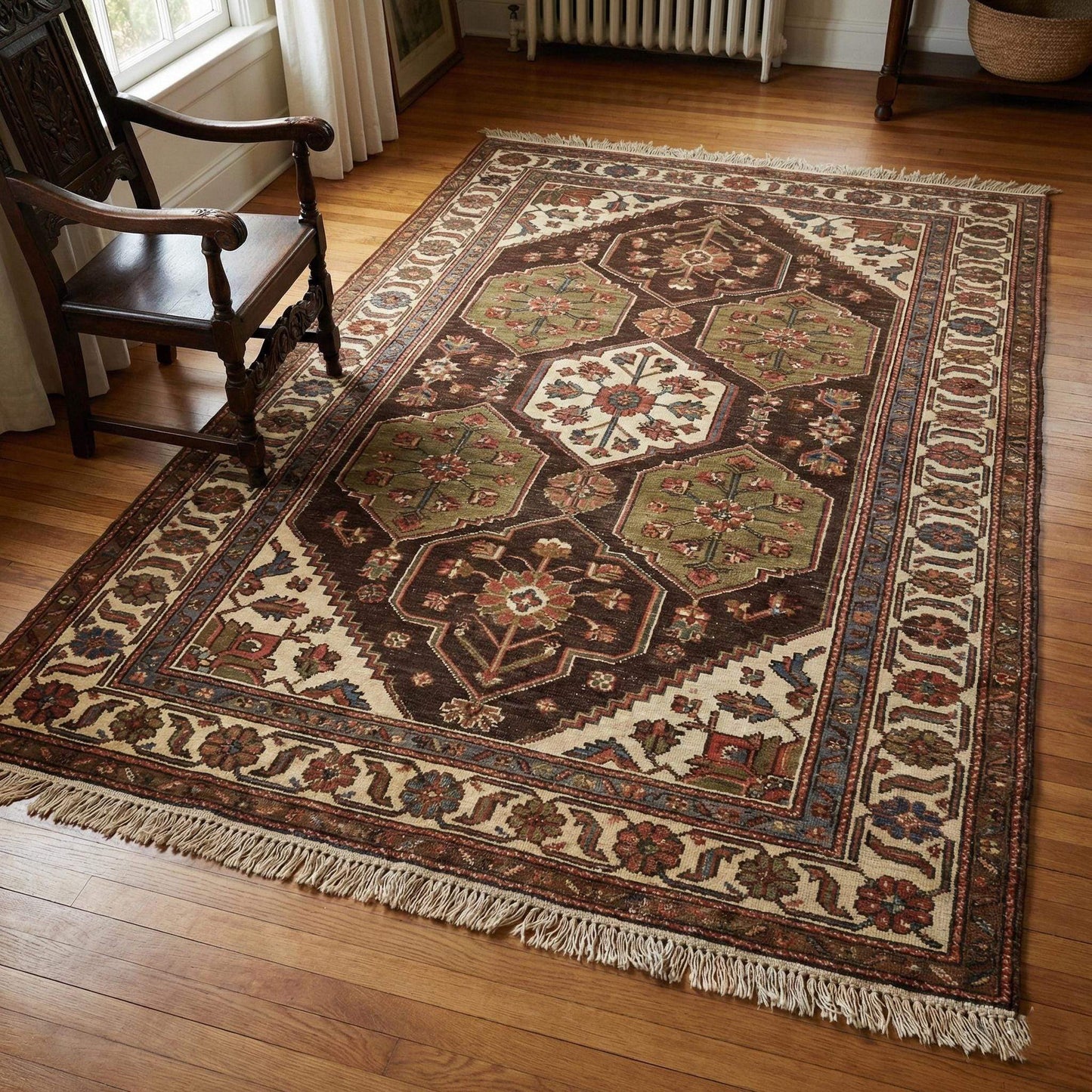 Hand knotted tribal wool area rug with geometric medallion design and natural texture