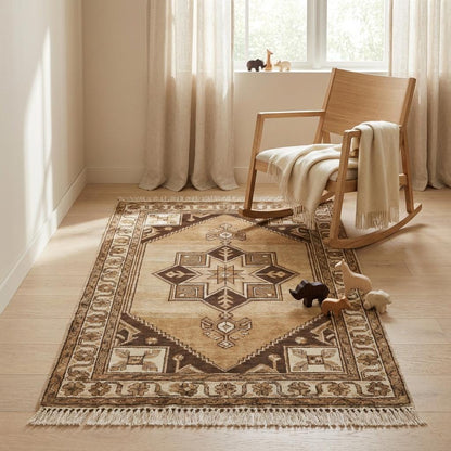 Beige and brown handmade wool rug with tribal patterns and artisan craftsmanship