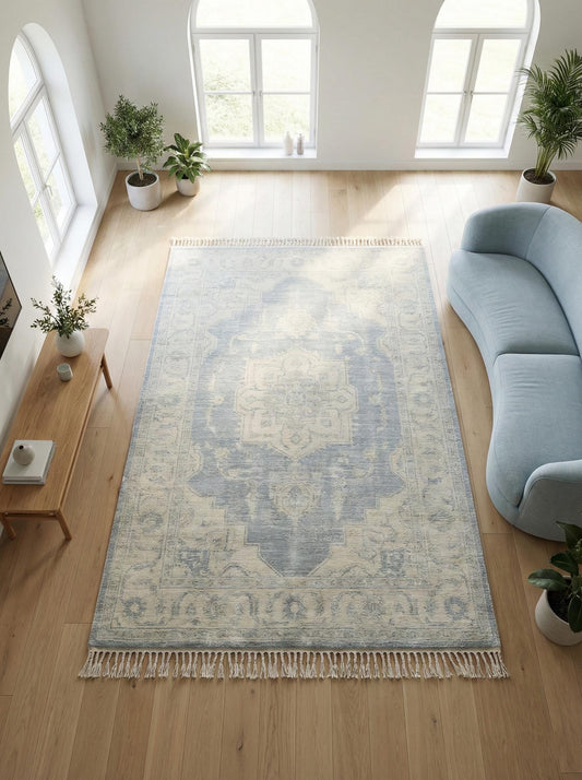 Hand knotted Persian vintage blue medallion wool rug with floral borders