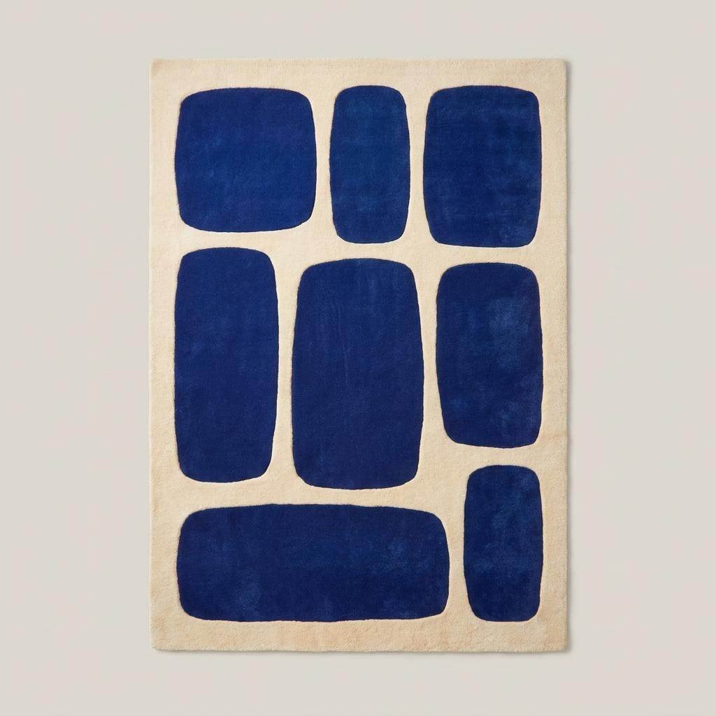Modern abstract area rug featuring cobalt blue geometric blocks on an ivory background for contemporary home decor __etsy:8083837390