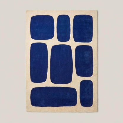 Modern abstract area rug featuring cobalt blue geometric blocks on an ivory background for contemporary home decor __etsy:8083837390
