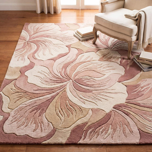 Hand tufted floral wool rug in blush pink and cream tones placed in a modern living room with soft neutral furniture __etsy:7869518324