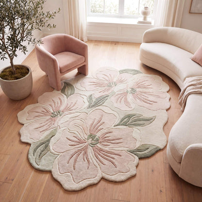 Hand tufted floral wool rug with oversized pink flowers and sage green leaves in a modern living room __etsy:8022433098