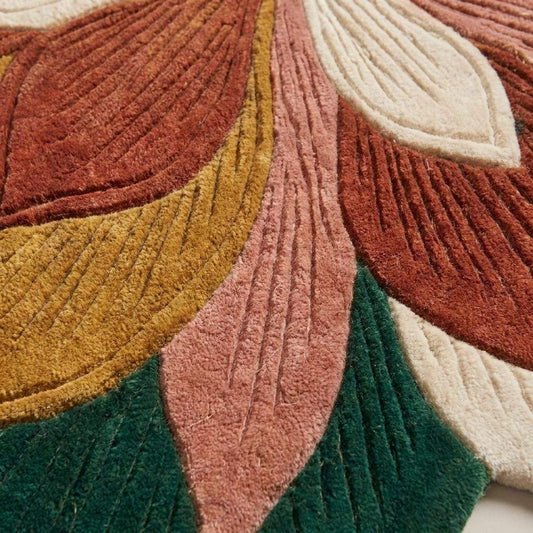 Close-up texture of handmade tufted wool rug showing carved cut pile detailing, dense fibers, sculpted floral petals, and soft premium surface __etsy:8053832987