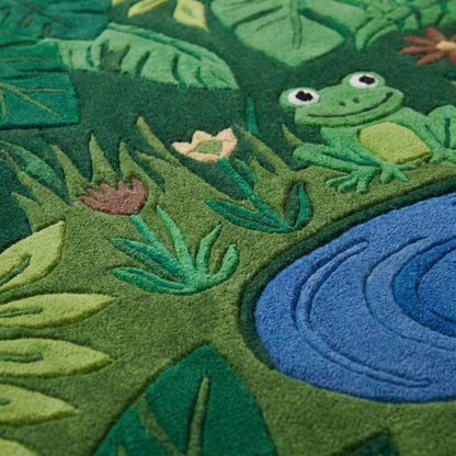 Close-up of hand tufted wool rug showing carved pile texture, raised leaf patterns, soft dense fibers and detailed frog design __etsy:7938691230