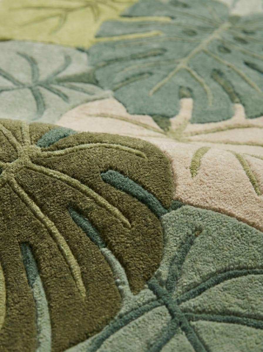Close-up of hand tufted wool runner rug showing dense cut pile texture, carved leaf detailing, premium wool fibers, and handcrafted construction __etsy:8140752293