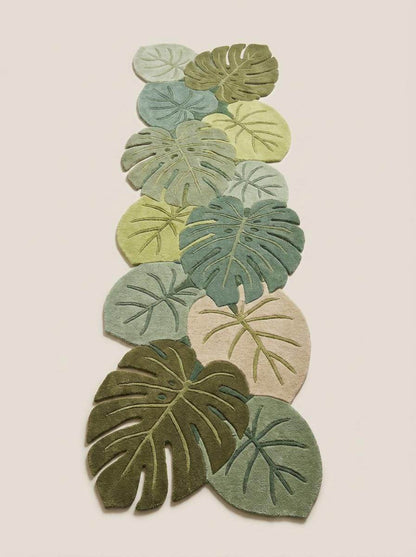 Tropical monstera leaf hallway runner rug designed with overlapping botanical elements and sculpted organic edges __etsy:8140752231