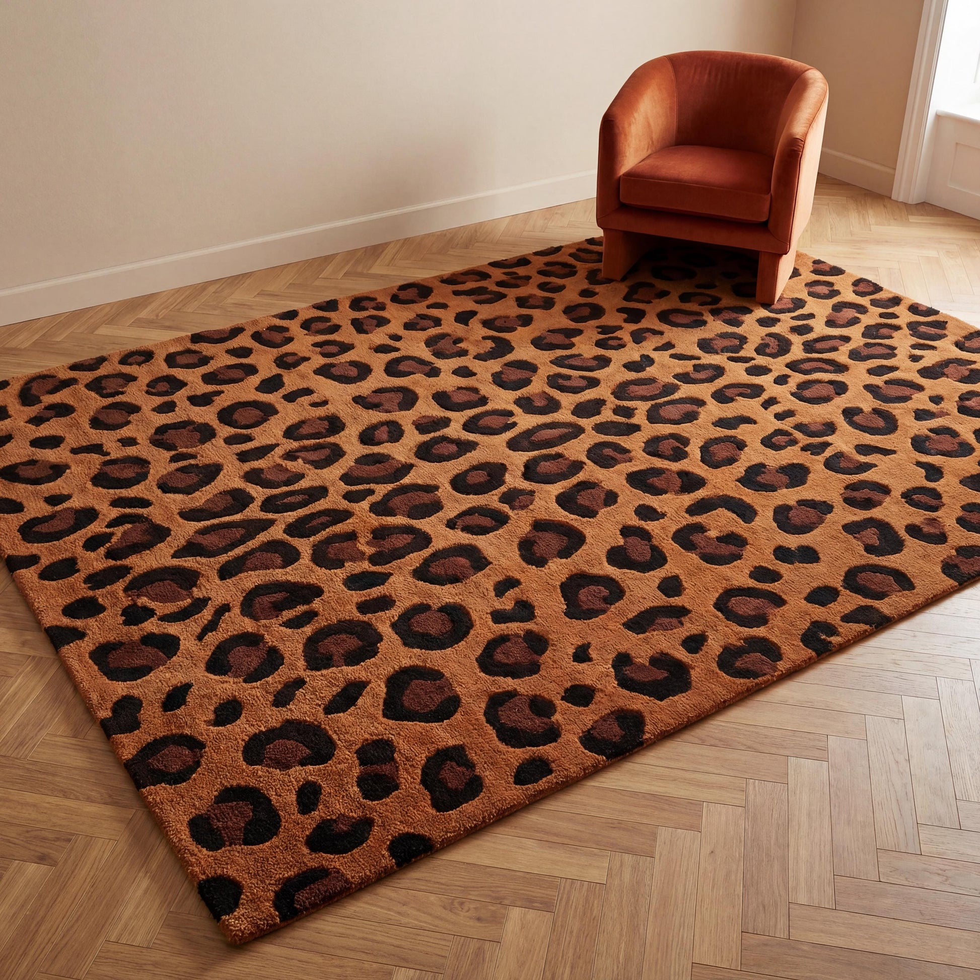 Hand tufted leopard print wool area rug 8x10 with dense pile and camel brown base.