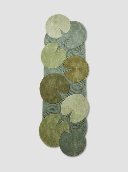Modern botanical runner rug displayed in a bright hallway with indoor plants, showcasing organic nature-inspired design and calming green tones. __etsy:8092988092