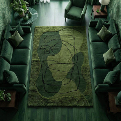 Hand tufted moss green abstract wool rug with high-low texture and modern line art design