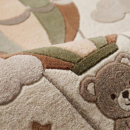 Close-up of soft wool hand tufted rug texture featuring plush cut pile construction with raised cloud and balloon details __etsy:7994313030