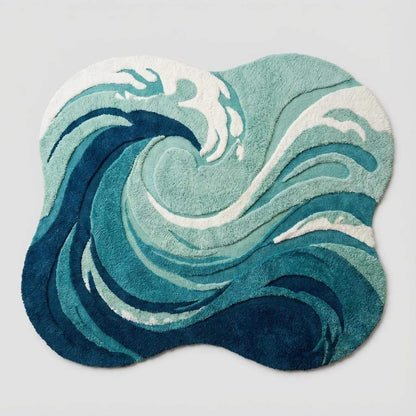 Teal and navy wave shaped rug, high-pile tufted texture with carved foam accents — statement accent rug for beach house, modern boho home decor.