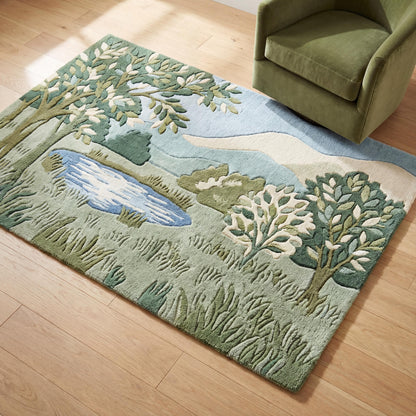 Hand tufted wool landscape rug with carved high low pile in green botanical design for living room