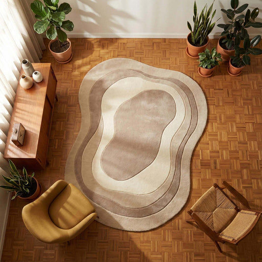 Irregular hand tufted wool rug with organic neutral tones and plush texture for modern Scandinavian decor