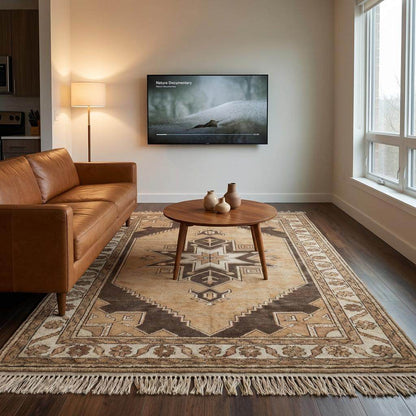Authentic hand knotted wool carpet with tribal medallion design and durable medium pile construction.