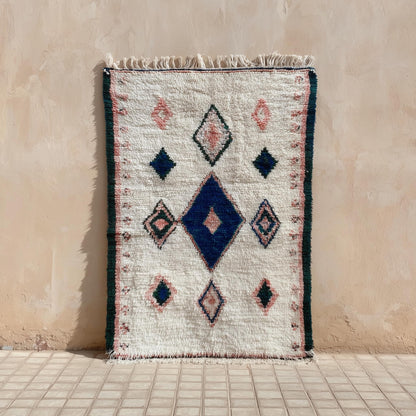 Handloom Moroccan Kilim Rug with indigo diamond pattern and wool texture in boho style