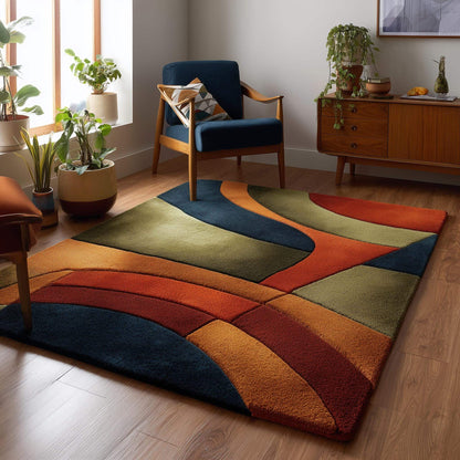 Handmade retro rug with curved geometric pattern in burnt orange, olive green, navy, and amber gold wool tufted carpet