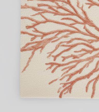 Handmade coral reef design tufted rug in beige and terracotta wool for coastal home décor