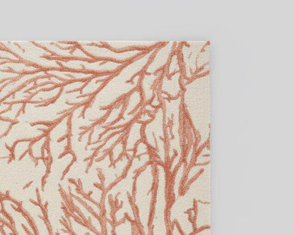 Handmade coral reef design tufted rug in beige and terracotta for coastal home décor