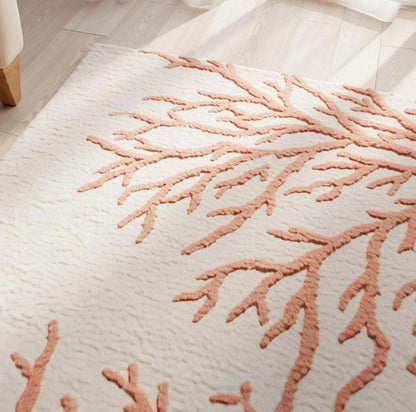 Handmade coral reef design tufted rug in beige and terracotta for coastal home décor