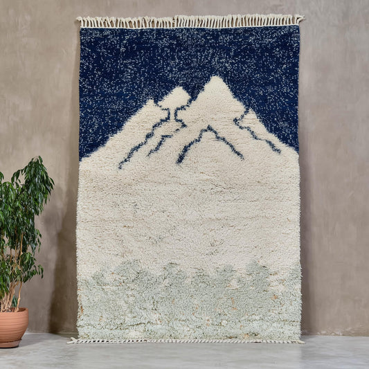 Handmade Moroccan wool rug with mountain Berber design in cream, navy, and sage tones