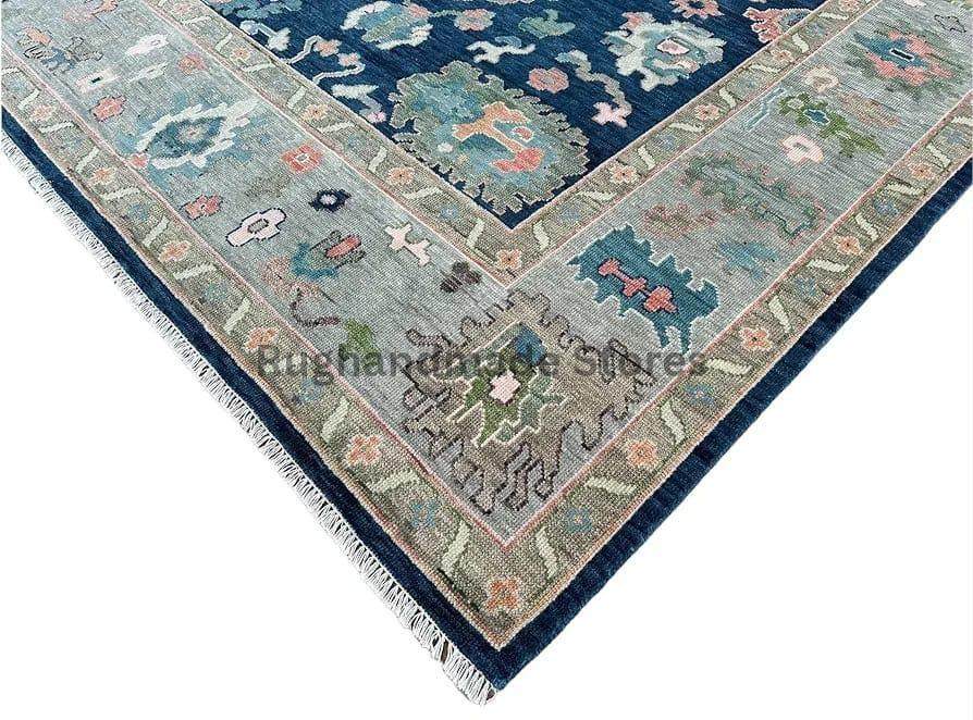 Handmade Oushak wool rug in blue and gray with intricate floral Turkish knot design for living room decor